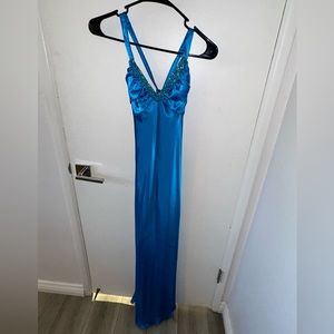 Woman’s Metallic blue long formal/prom dress. Size small
